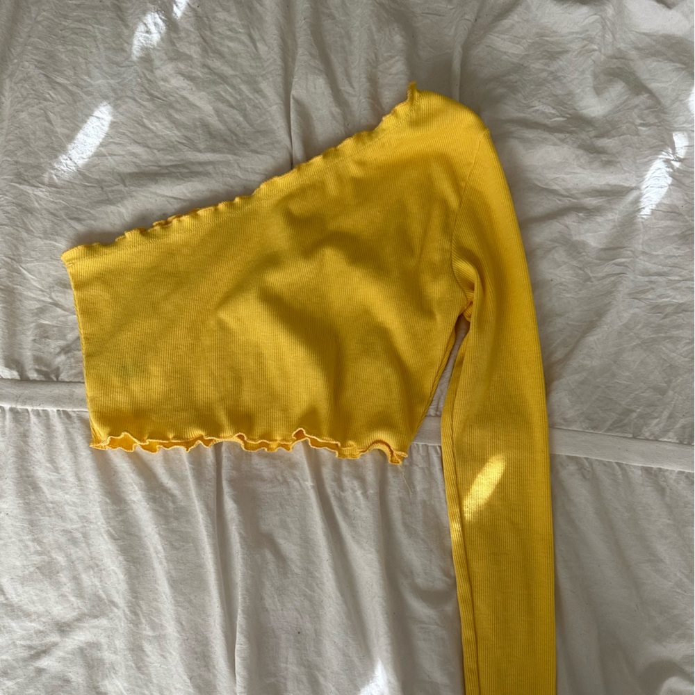 Bright yellow one shoulder long sleeve crop top